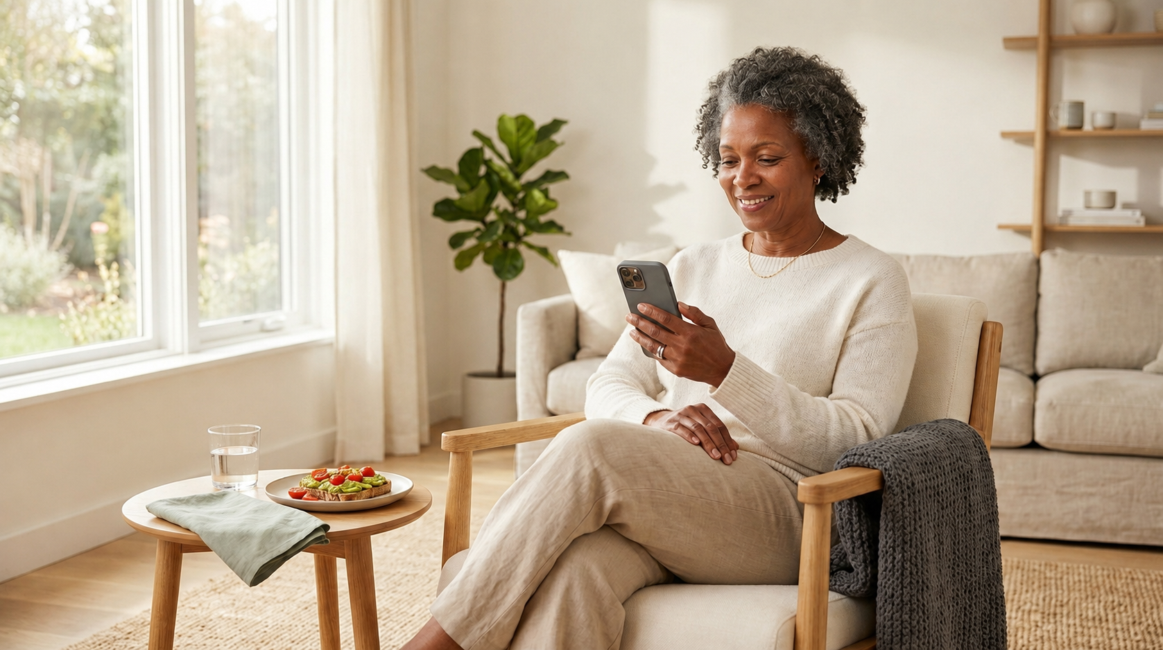 Person following a GLP-1 lifestyle routine reviewing their daily reading on the MydailyLab metabolic health app at home.